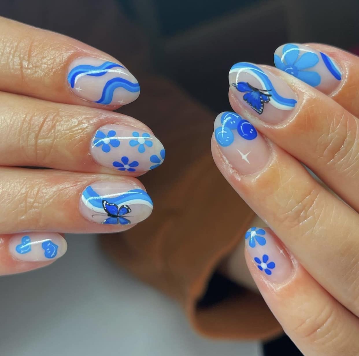blue swirl and flower nails