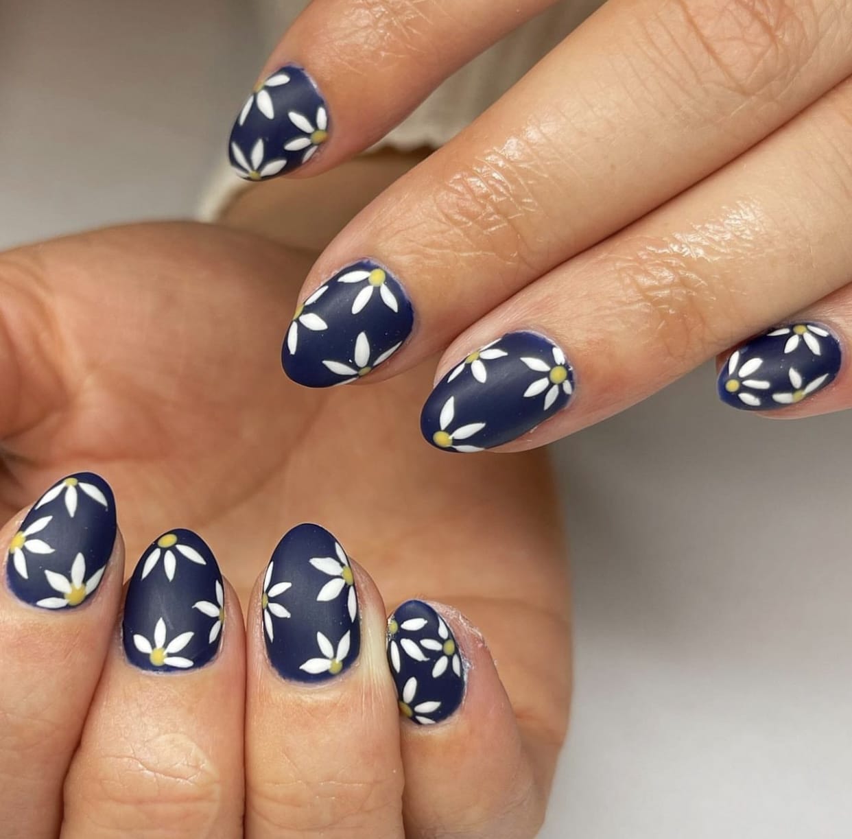 dark blue nails with flowers