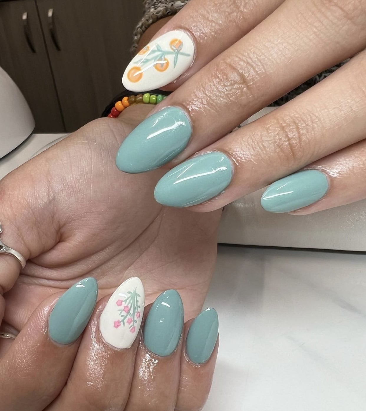 coastal sea green nails with flowers